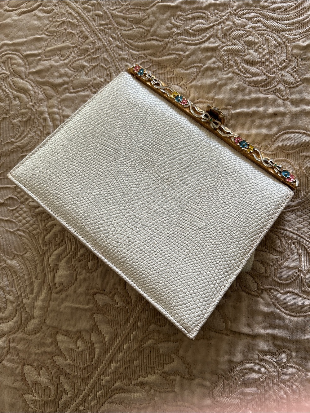 Elegant White Textured Frame Clutch with Floral Gem Trim